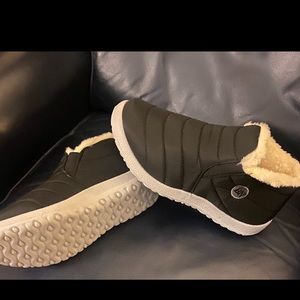 Women’s warm, waterproof,  anti- slip boots. Brand new, never worn, size 6.5